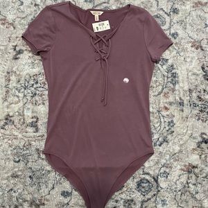 Mauve body suit